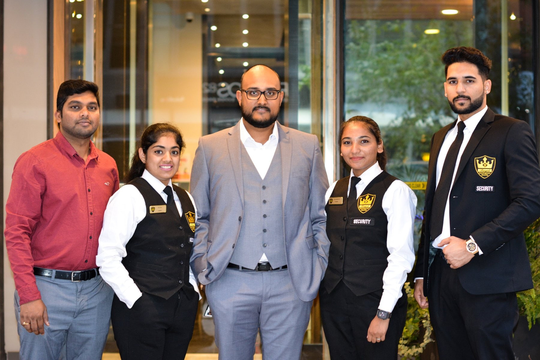 The Royal Concierge and Security team in uniform outside a Toronto condominium
